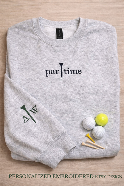 Par Time embroidered golf sweatshirt flat lay